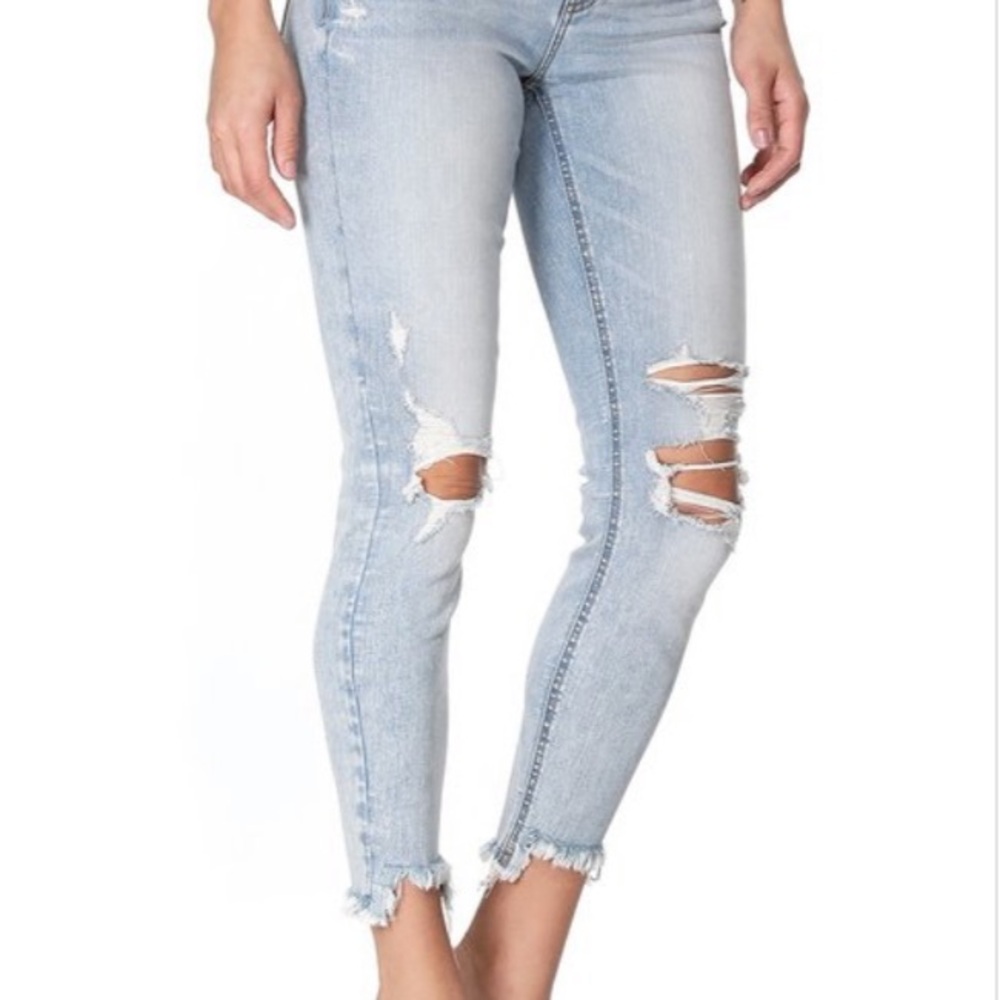 Distressed Light Blue Jeans